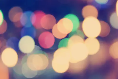 An abstract image of blurred lights of different colors