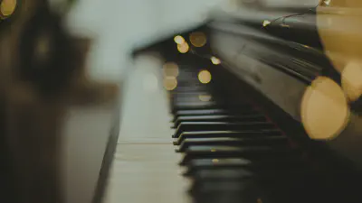 A piano with a very thin depth of field so only a few of the piano keys are in focus